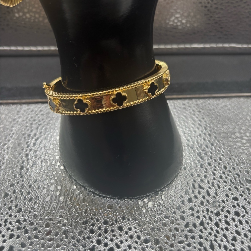 Elegant Gold Banles with Black Accents